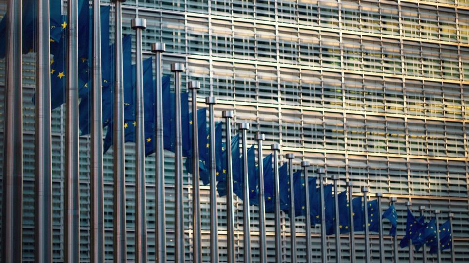 EU flags in front of the Commission in Brussels
