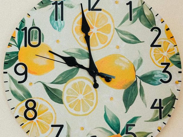 Wall clock with printed lemons