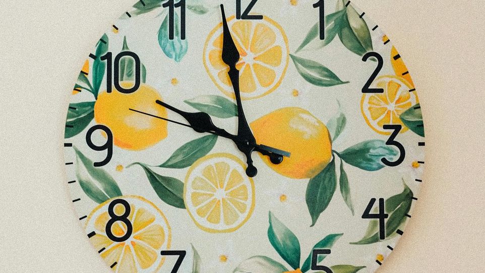 Wall clock with printed lemons