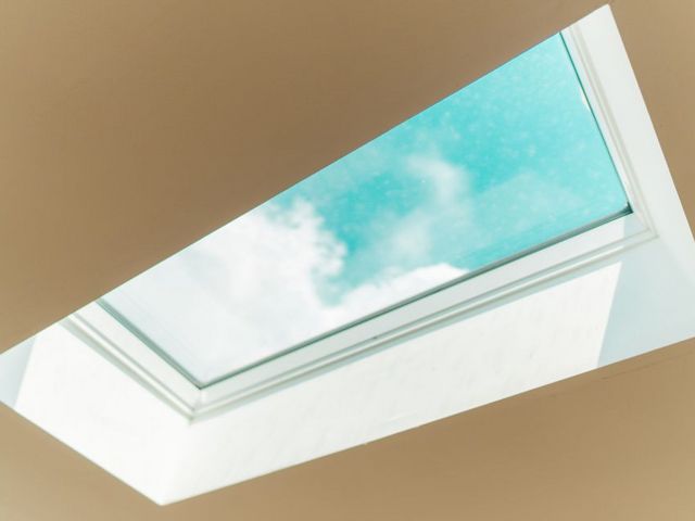 View of the sky through an open window