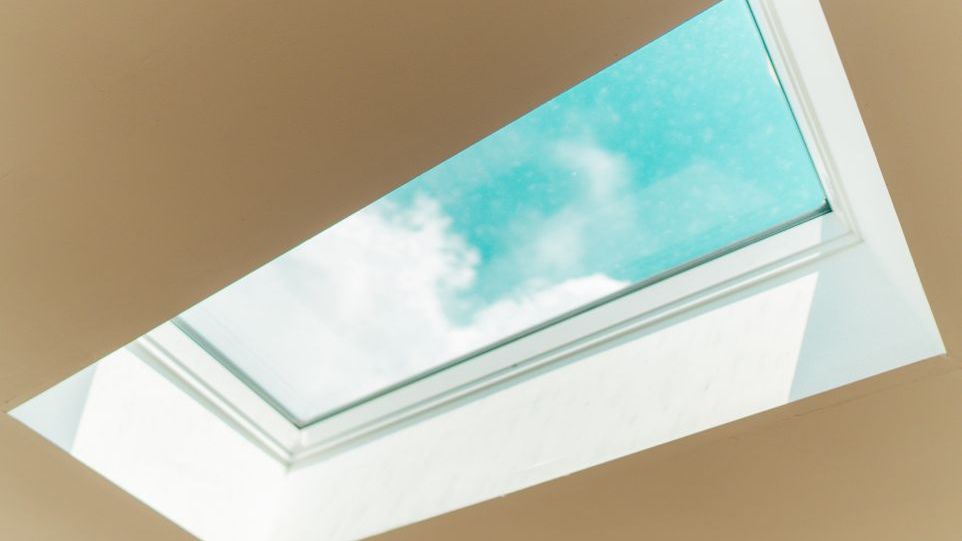 View of the sky through an open window